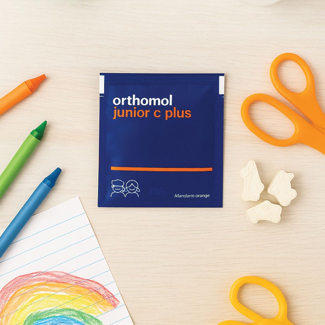 Orthomol Immun Junior C Plus child taking supplement during meal.
