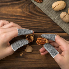 Ouligay finger cots black pack offer cut resistance for kitchen tasks.