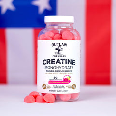 Label and third-party seal visible on Outlaw Formulas gummies.