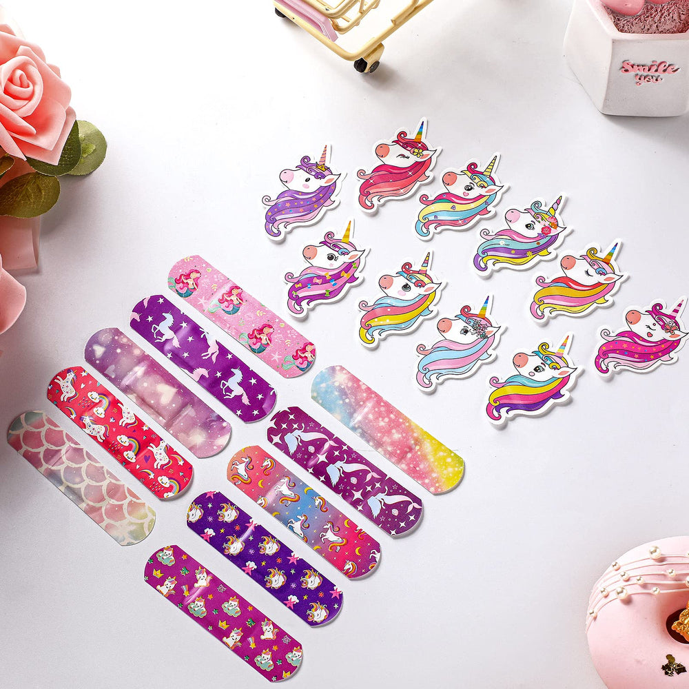 Panelee unicorn-pattern bandages in multiple shapes for small injuries.