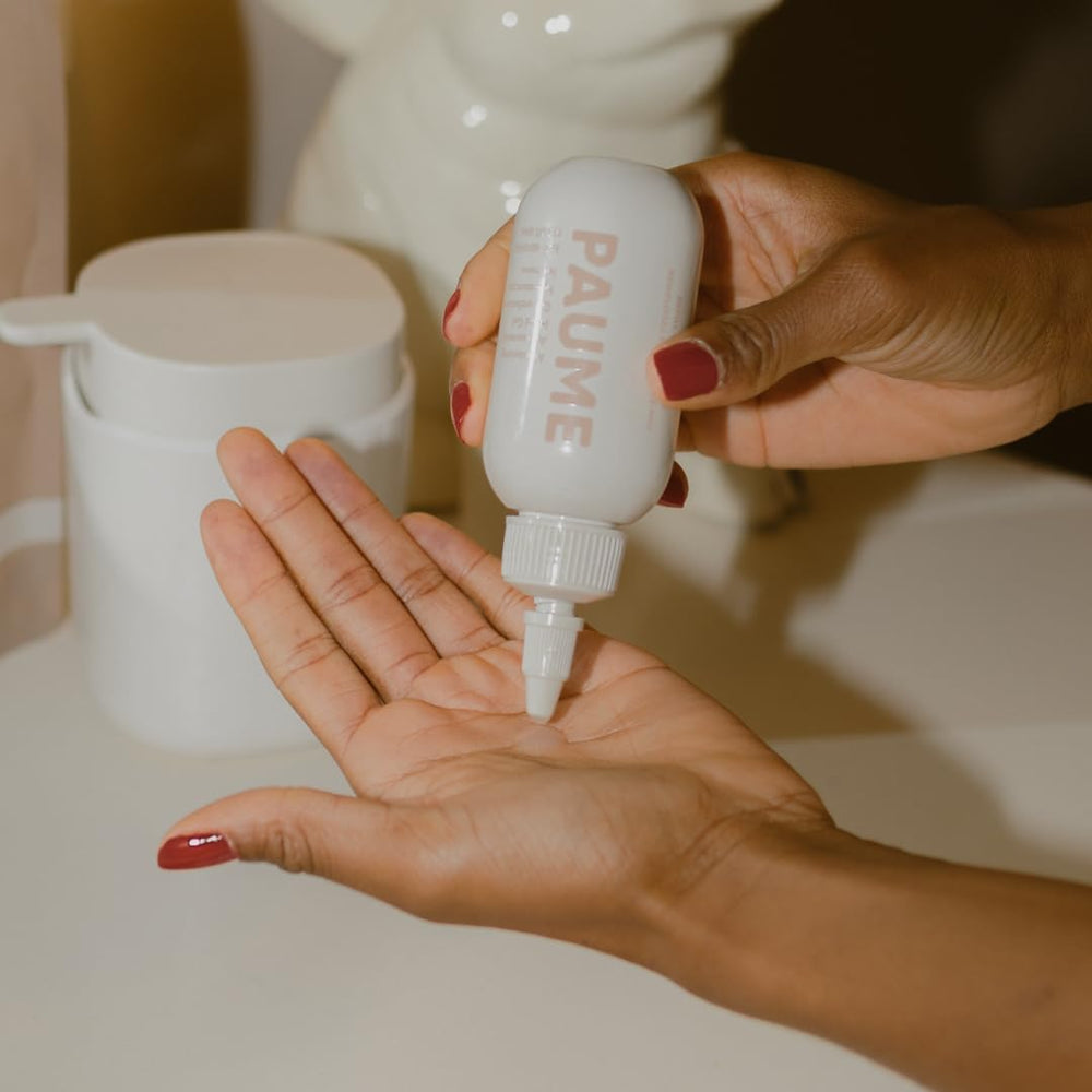 PAUME lifestyle shot suggests quick refresh after workouts or meetings.