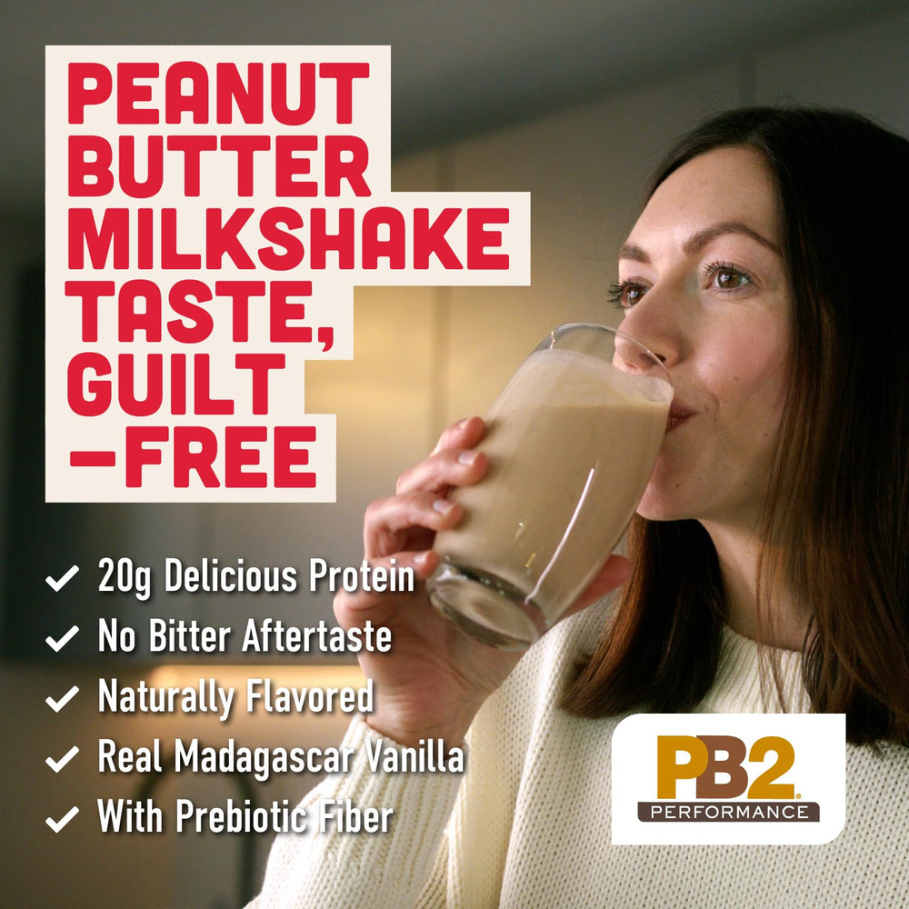 Pouring PB2 into shaker bottle for dairy free shake