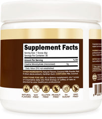 Close-up of Perk Creamatine powder scoop showing 5 g creatine per serving.