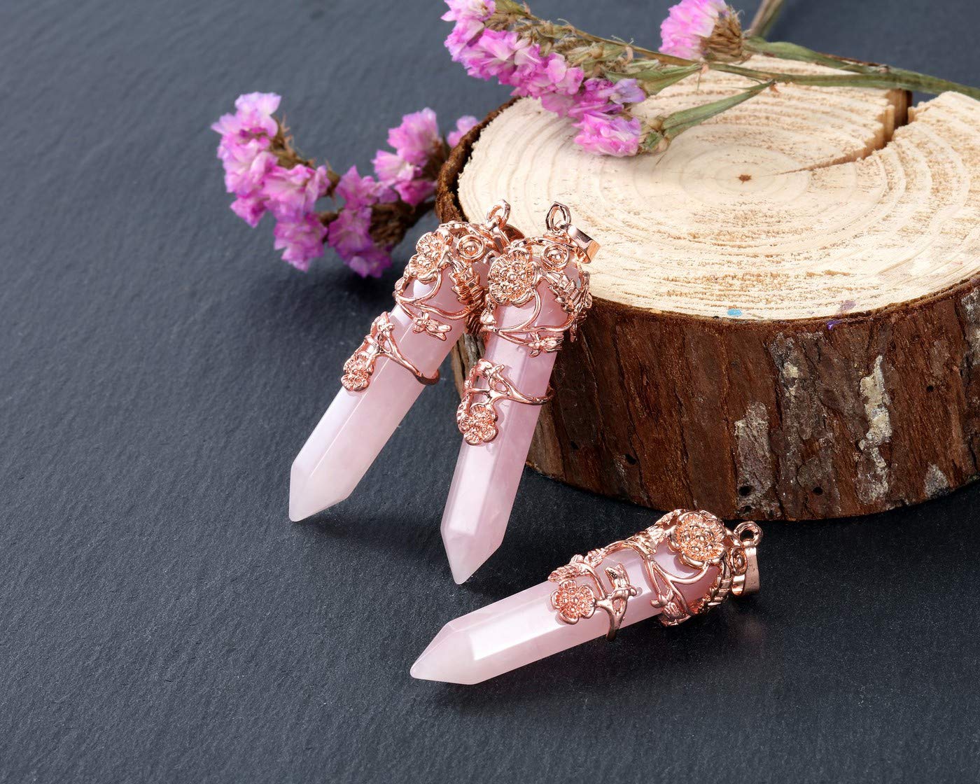 PESOENTH rose quartz point pendant highlighting energy direction for focus.