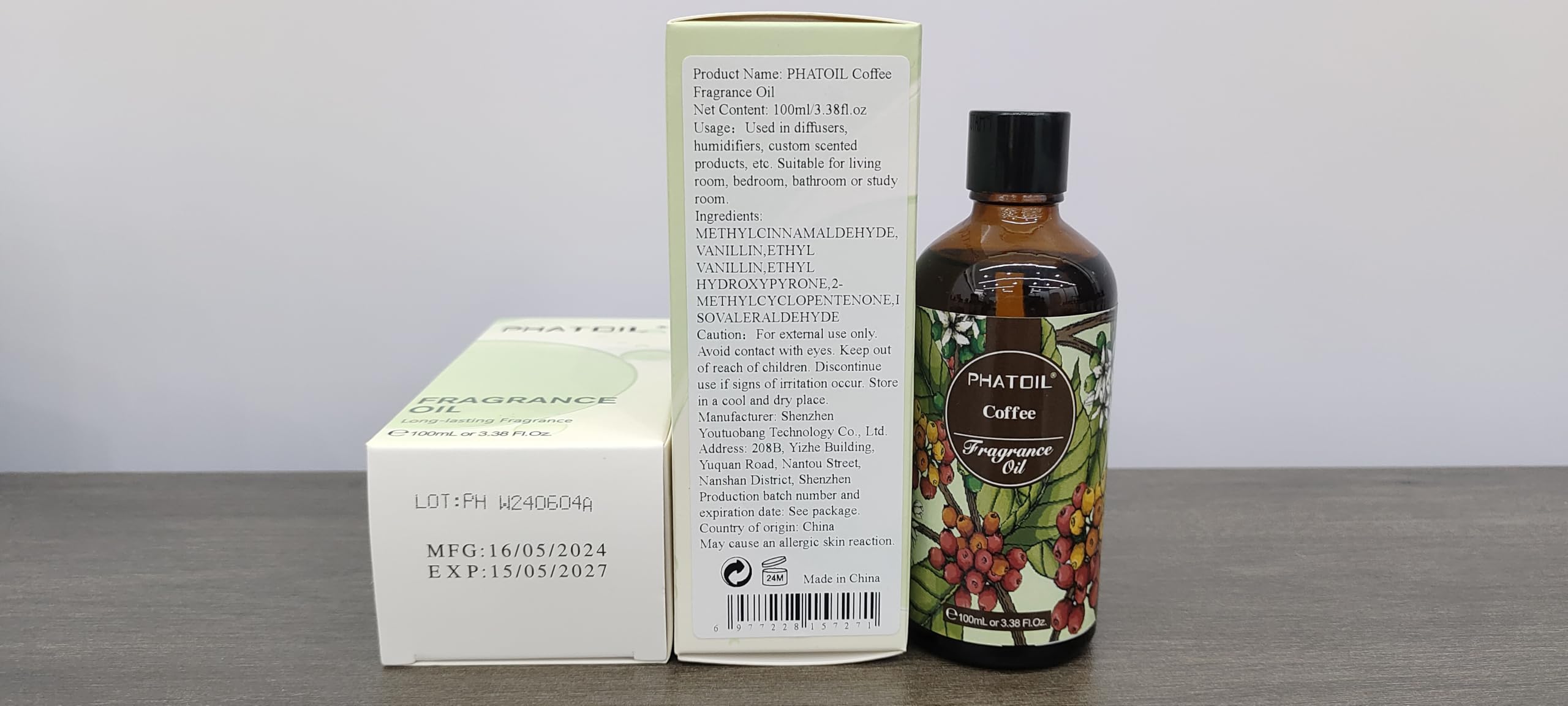 PHATOIL coffee aroma beside diffuser creates inviting sensory ambiance.
