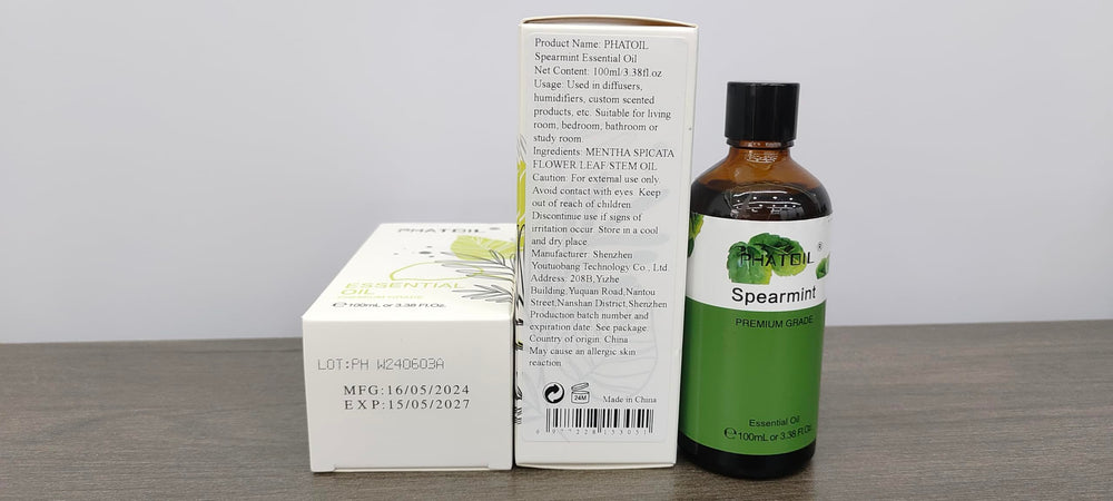 Close-up of PHATOIL Spearmint label and dropper for precise measurement
