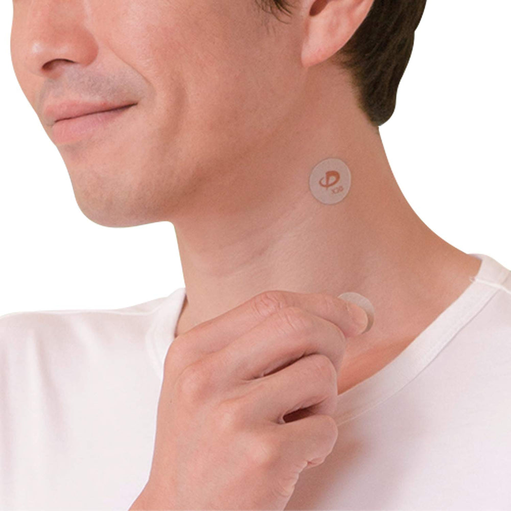 Phiten X30 closeup image highlights circular discs designed for flexible placement.