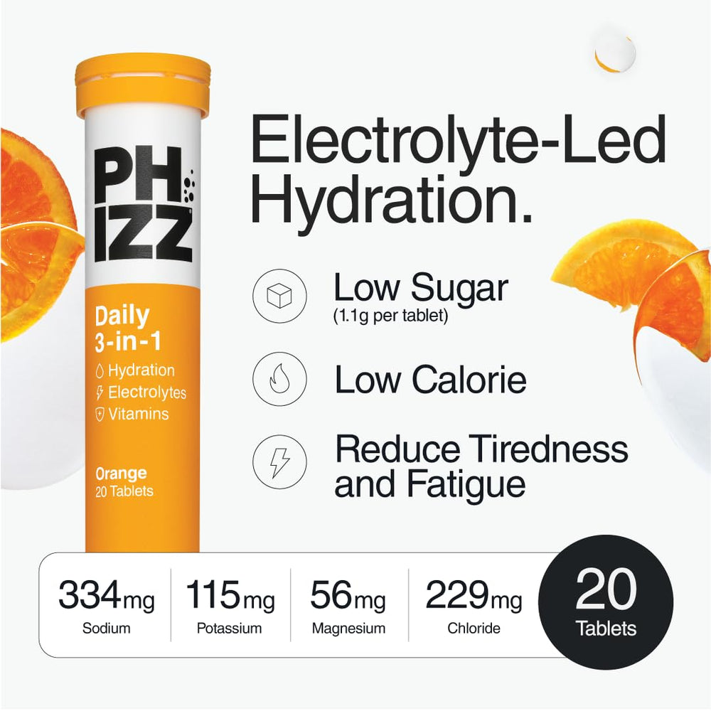 Phizz tablet dissolving in a glass, showing orange fizz and refreshing hydration.