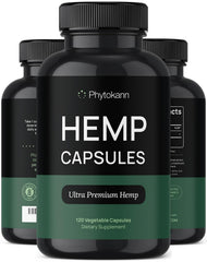 Phytokann hemp oil capsules bottle on a wood surface suggesting daily calm and wellness