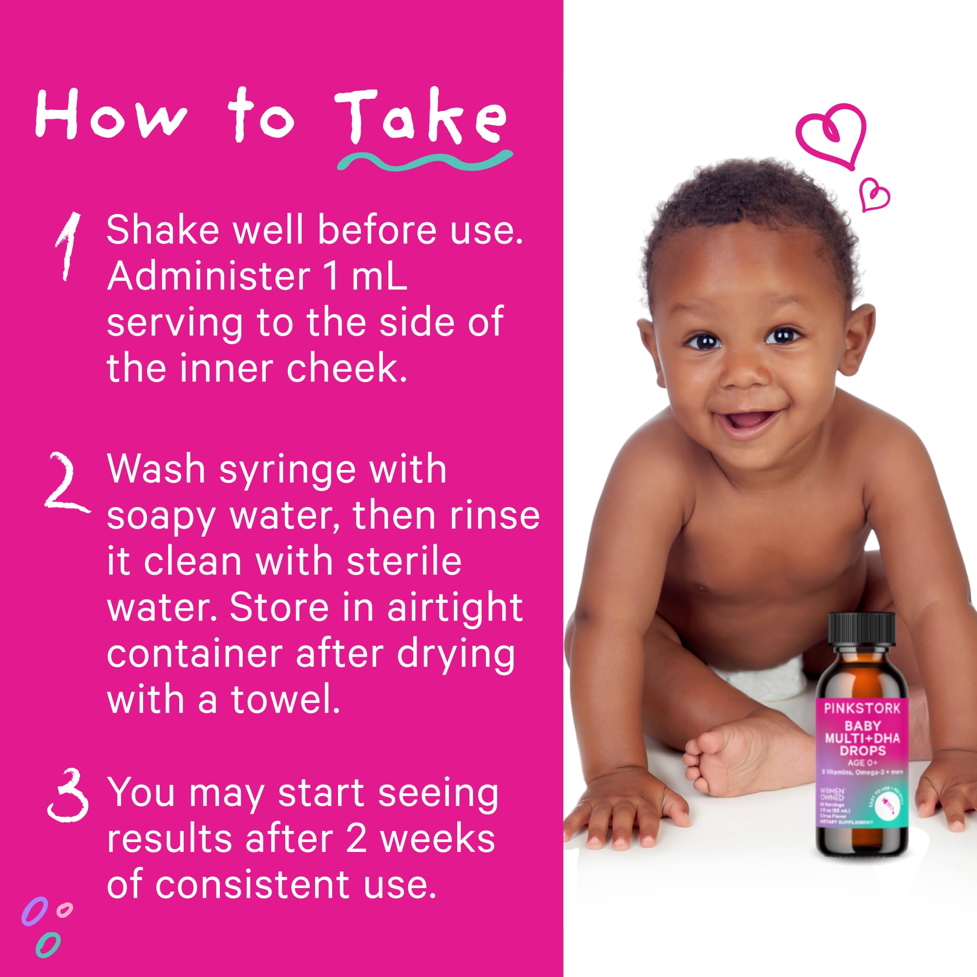 Pink Stork Baby Multivitamin Drops beside a feeding setup for daily use.