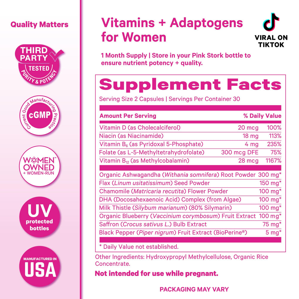 Pink Stork Cortisol Complex bottle on a work desk for daytime use.