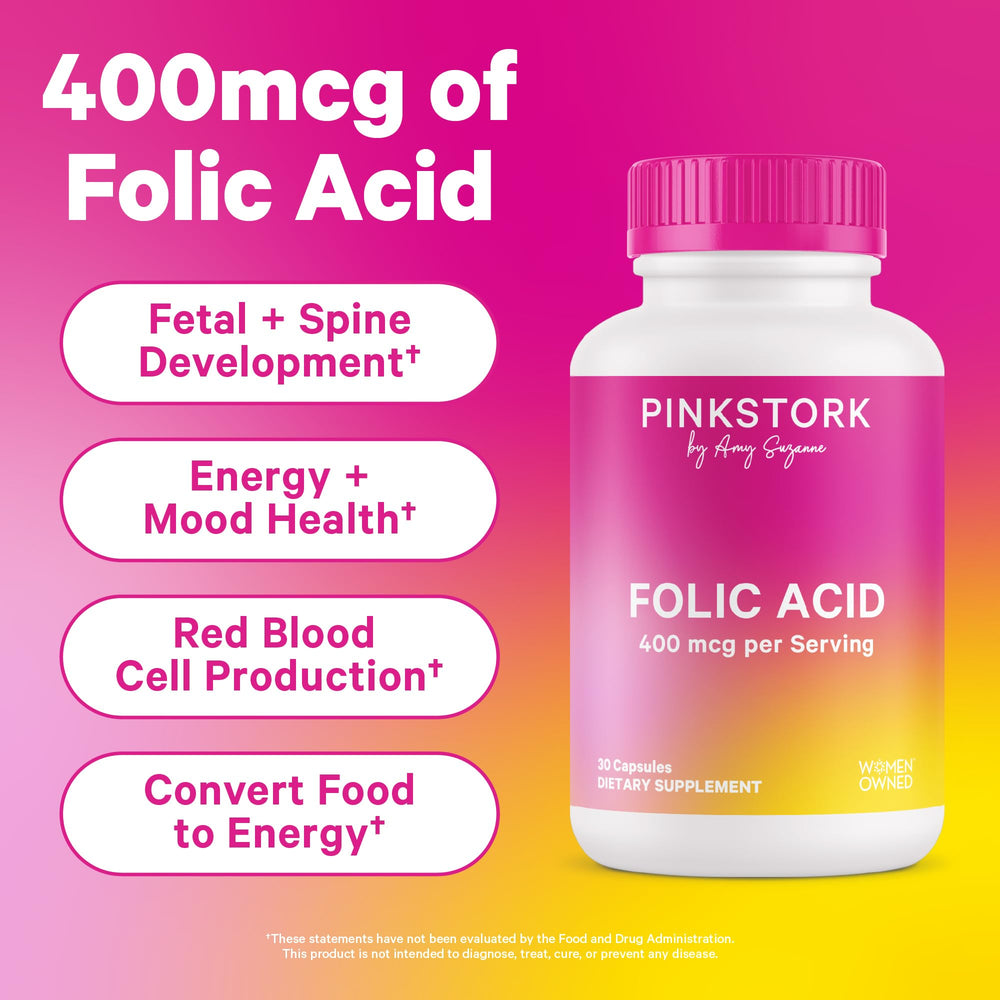 Closeup of Pink Stork folic acid capsules in a bottle.