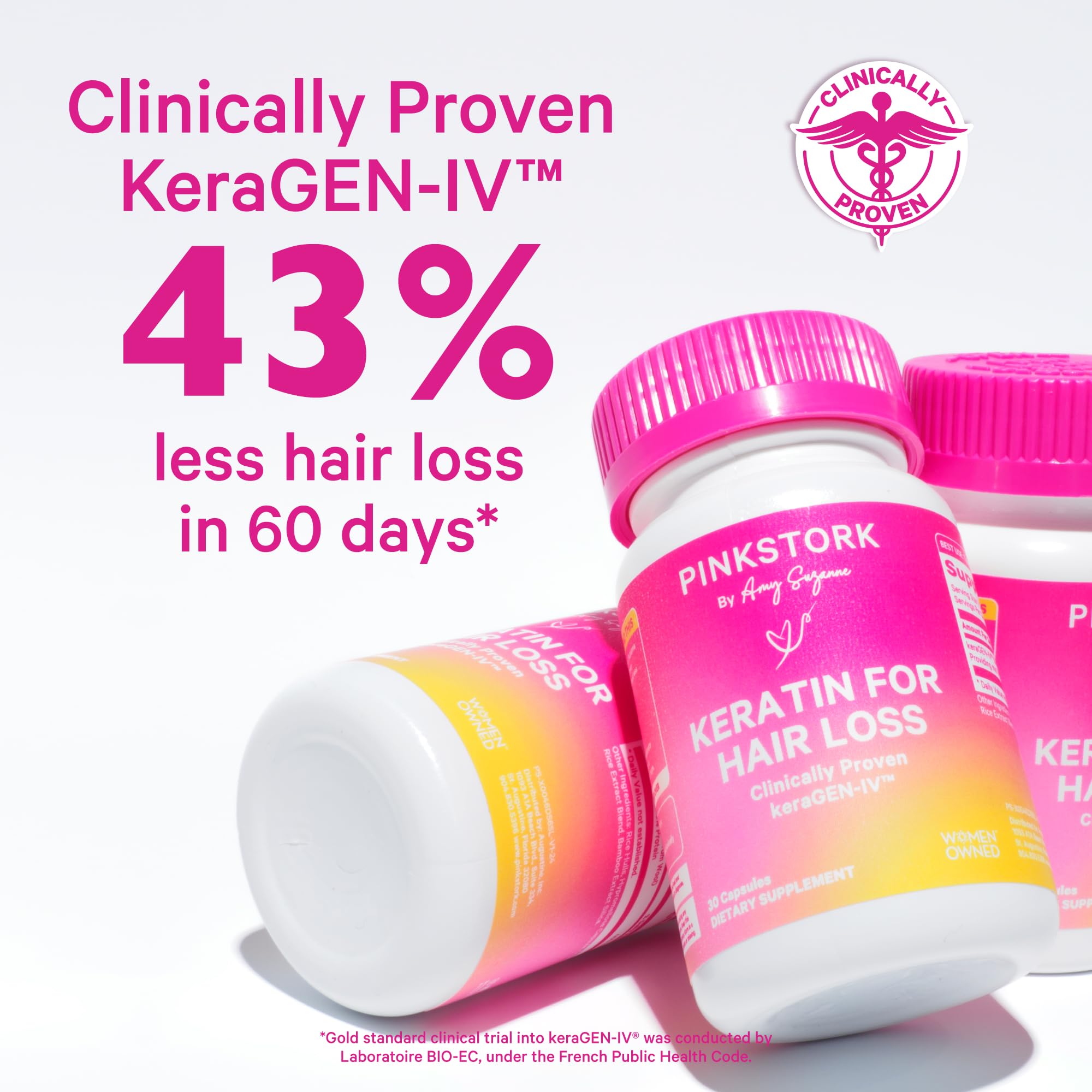 Pink Stork Keratin packaging closeup displaying product branding and features.