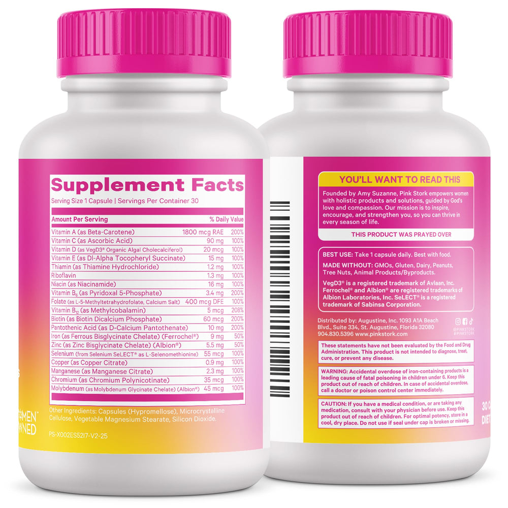 Pink Stork Total Women’s Multivitamin capsules close-up showing nutrients.