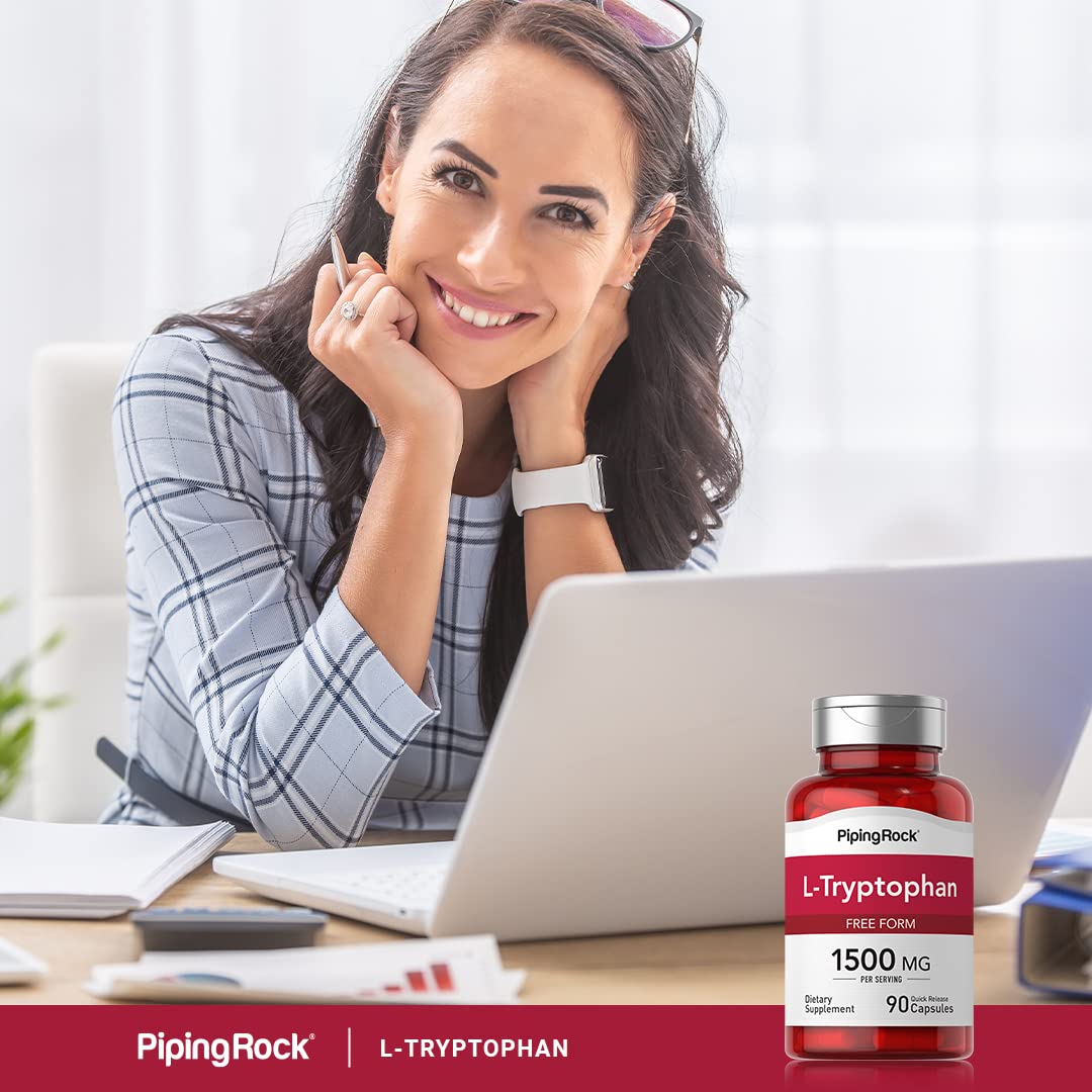 Piping Rock L-Tryptophan 1500 mg capsules beside glass of water for easy intake.
