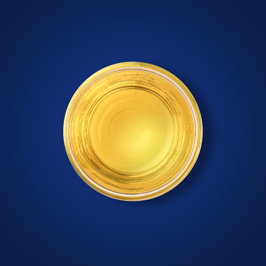 Piping Rock Cod Liver Oil Liquid serving pour for easy dosing.