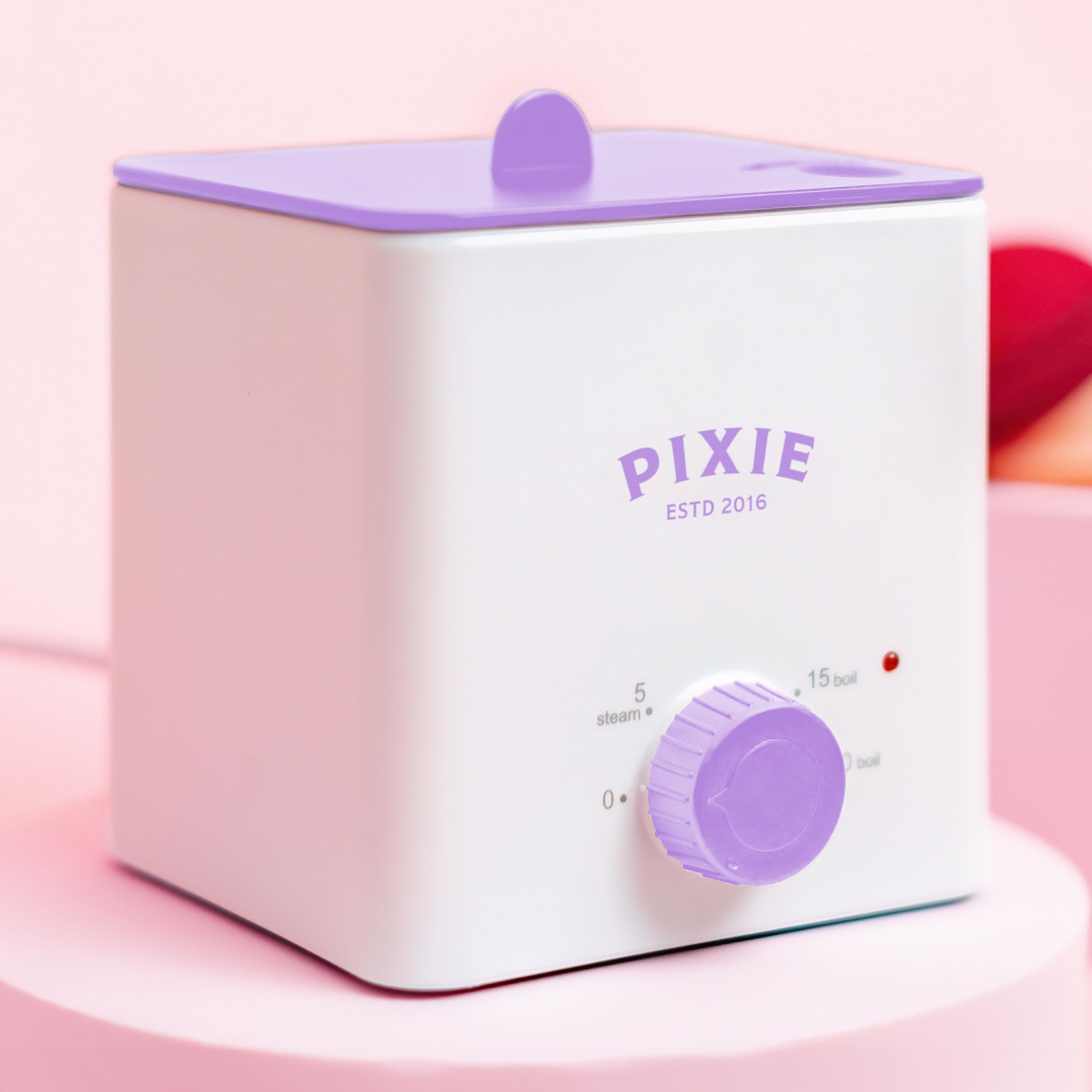 Pixie Cup boiler sterilizer on a counter, space-saving for shared homes.