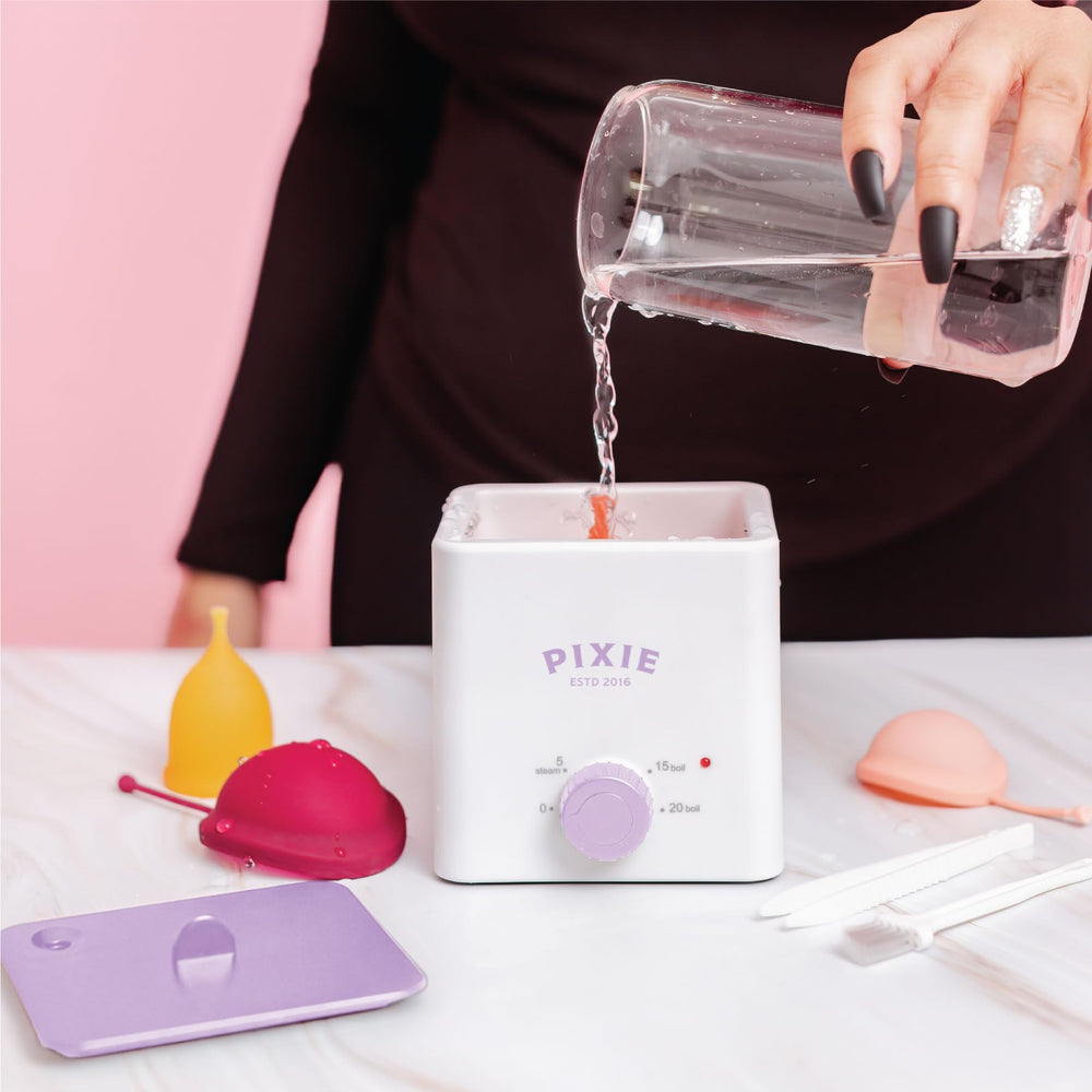 Pixie Cup boiler sterilizer discreet dorm-friendly design in a living space.