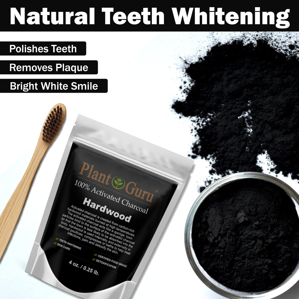 Plant Guru activated charcoal powder on toothbrush for teeth whitening prep.