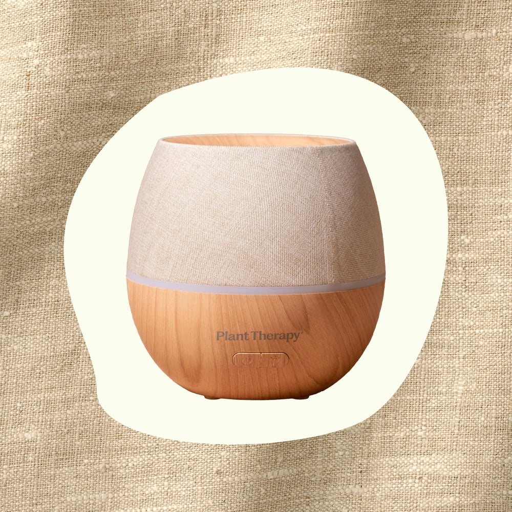Plant Therapy Drift Linen Diffuser color-changing light adding ambient glow to any room.