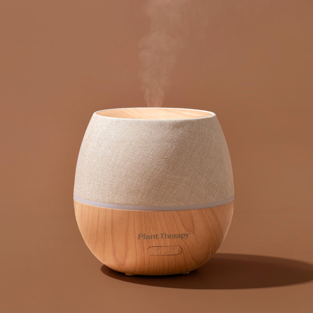 Plant Therapy Drift Linen Diffuser wood-like base provides warm, natural visual appeal.