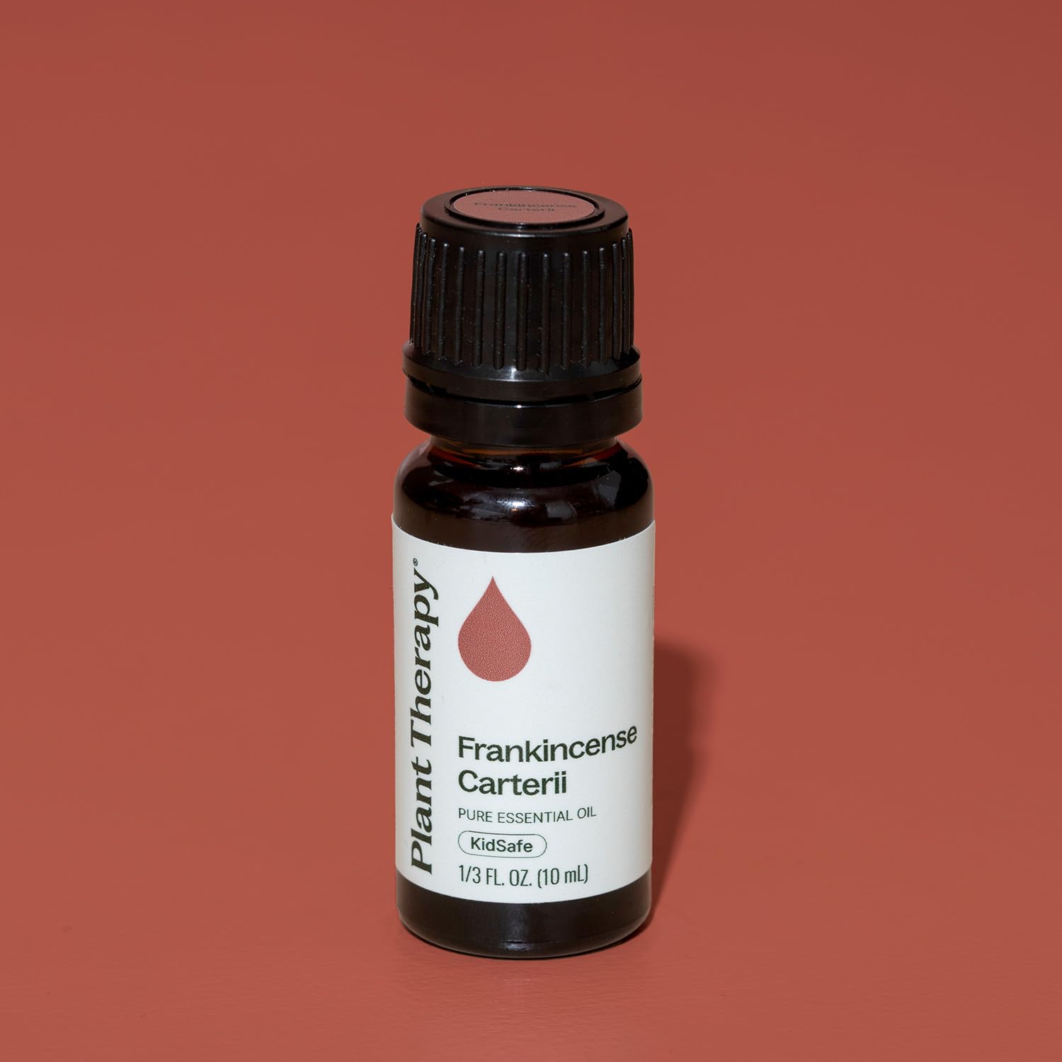 Plant Therapy Frankincense Carterii bottle with label, signifying affordable, high-quality essential oil.