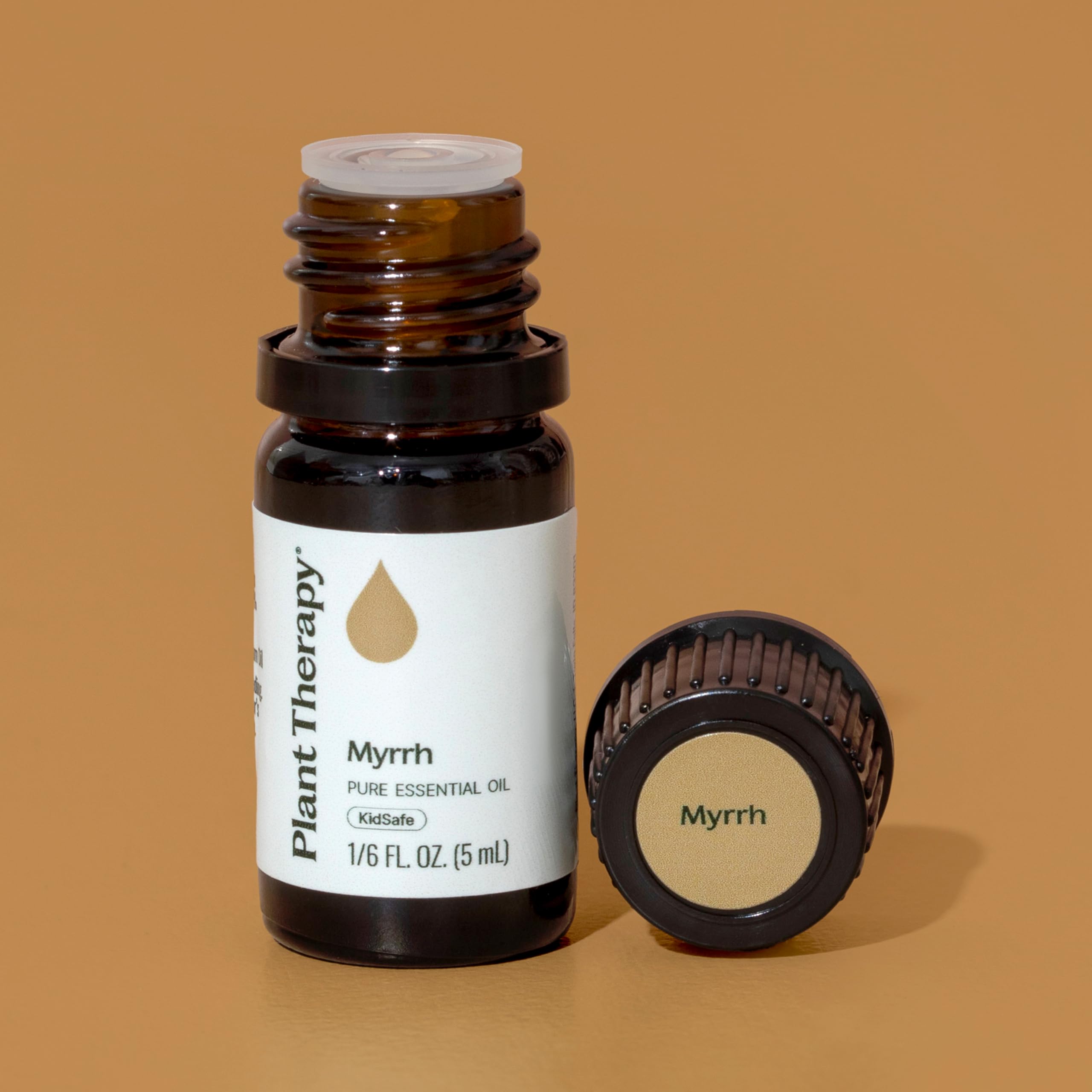 Plant Therapy Myrrh oil drops near diffuser illustrating calming use