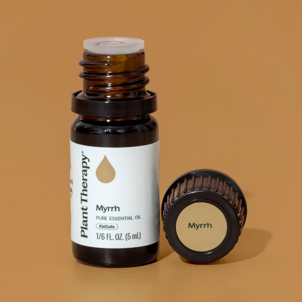 Plant Therapy Myrrh oil drops near diffuser illustrating calming use