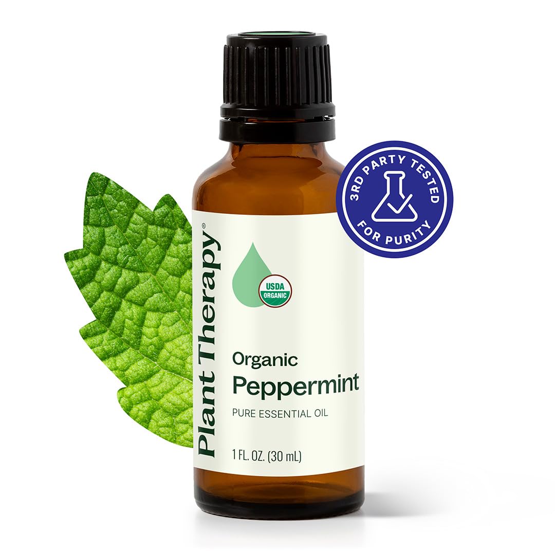 Close-up of Plant Therapy peppermint oil bottle for skin and hair care