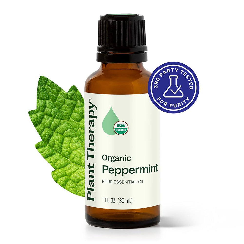 Close-up of Plant Therapy peppermint oil bottle for skin and hair care
