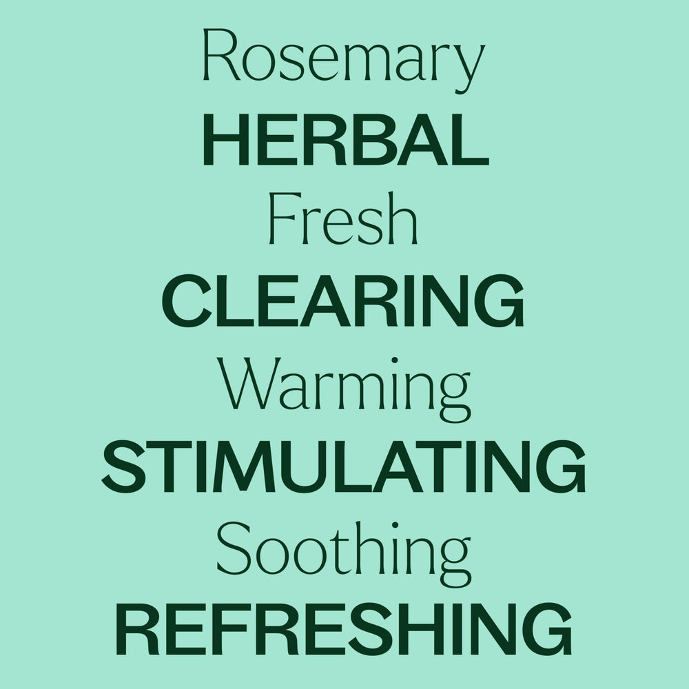 Close-up of Plant Therapy rosemary oil bottle with label.
