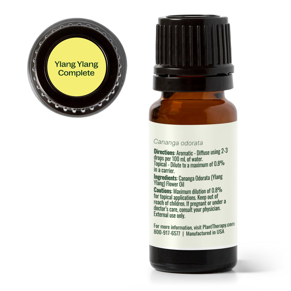 Plant Therapy Ylang Ylang Complete oil bottle with Madagascar blossoms inspiration.