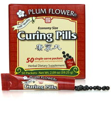 Plum Flower Kang Ning Wan curing pills stick-pak for portable, on-the-go use.