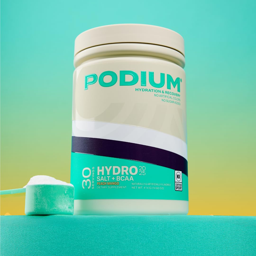 Podium Nutrition Hydro + Salt glass shows refreshing Peach Mango hydration