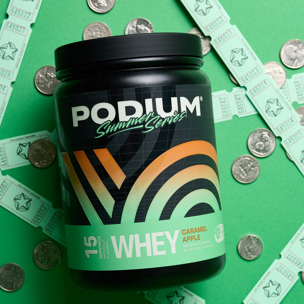 Podium Nutrition Caramel Apple shake in glass underscores tasty flavor options post-workout.