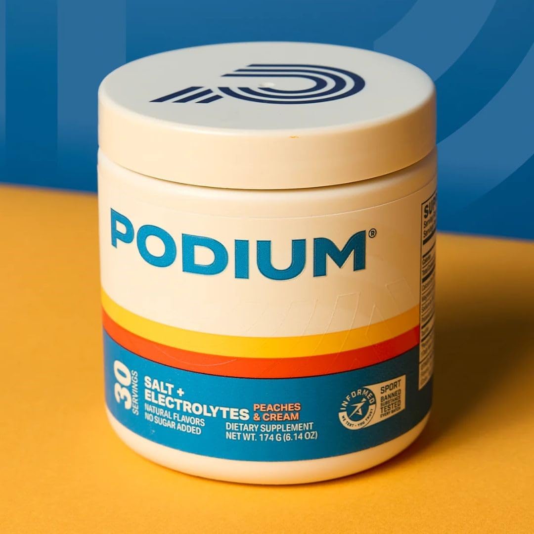 Podium Salt+Electrolytes Peaches & Cream powder scoop for easy serving.
