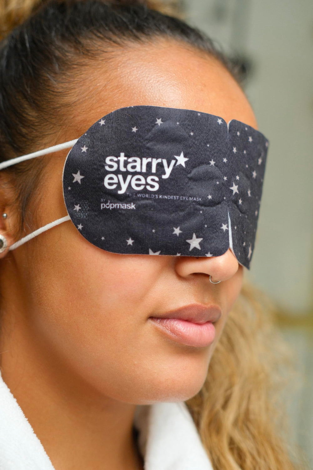 POPBAND Popmask Starry Eyes travel pack highlights portable, individually wrapped masks.