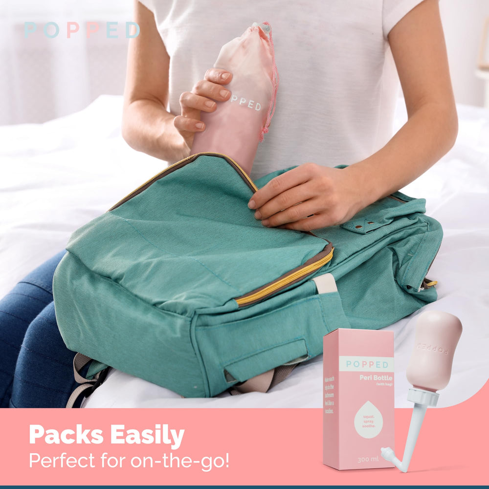 POPPED peri bottle with easy-grip handle for comfortable one-handed use.