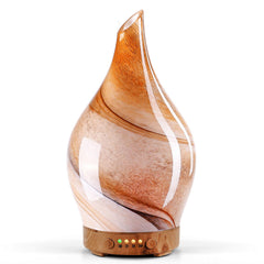 Porseme Desert glass diffuser with ambient glow for calming spaces.