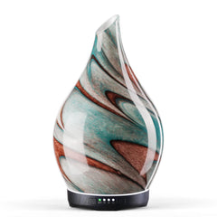 Porseme diffuser with teal glass cover creating a calming ambience in a room