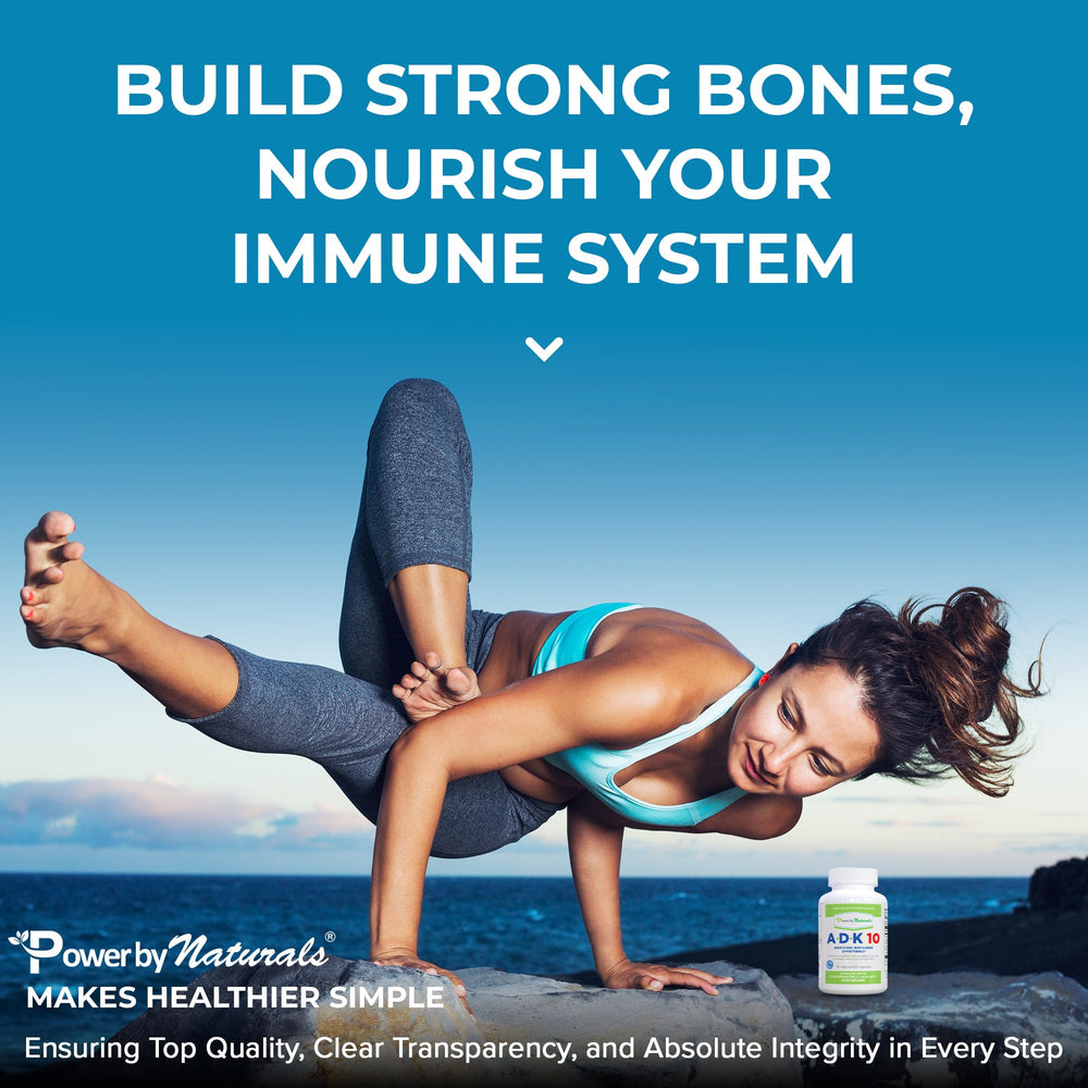 Power By Naturals ADK 10 capsule close-up showing smooth texture for easy swallowing.