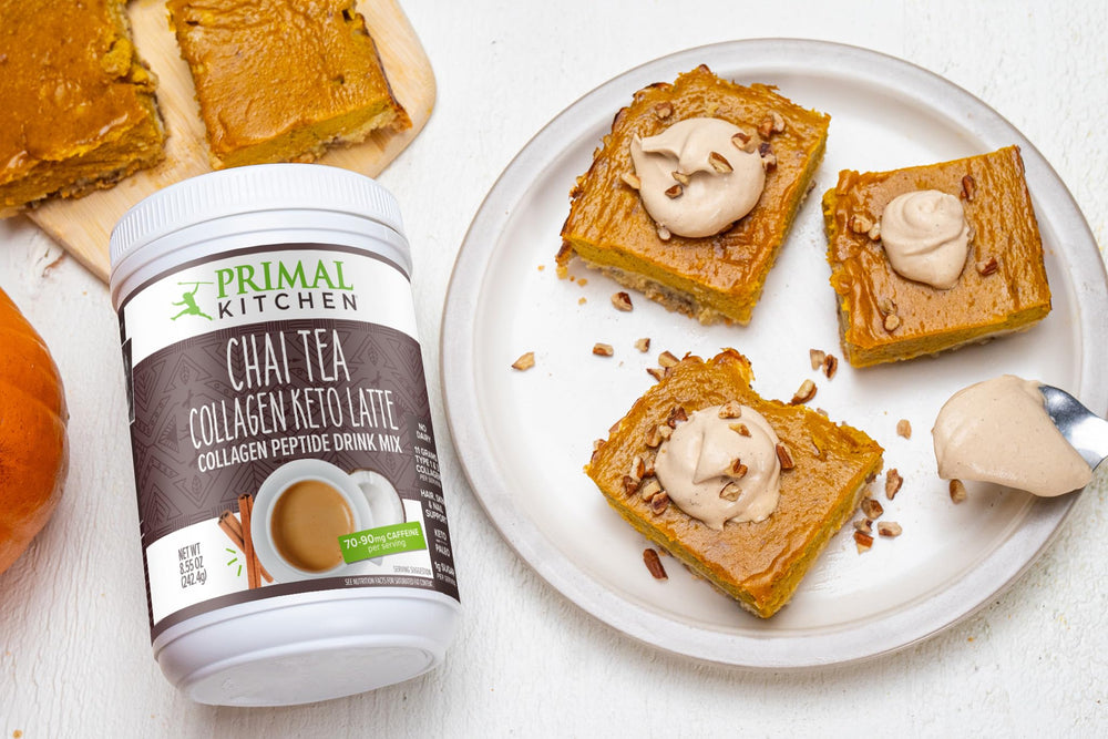 Pouring ready chai latte with a reusable cup featuring Primal Kitchen mix