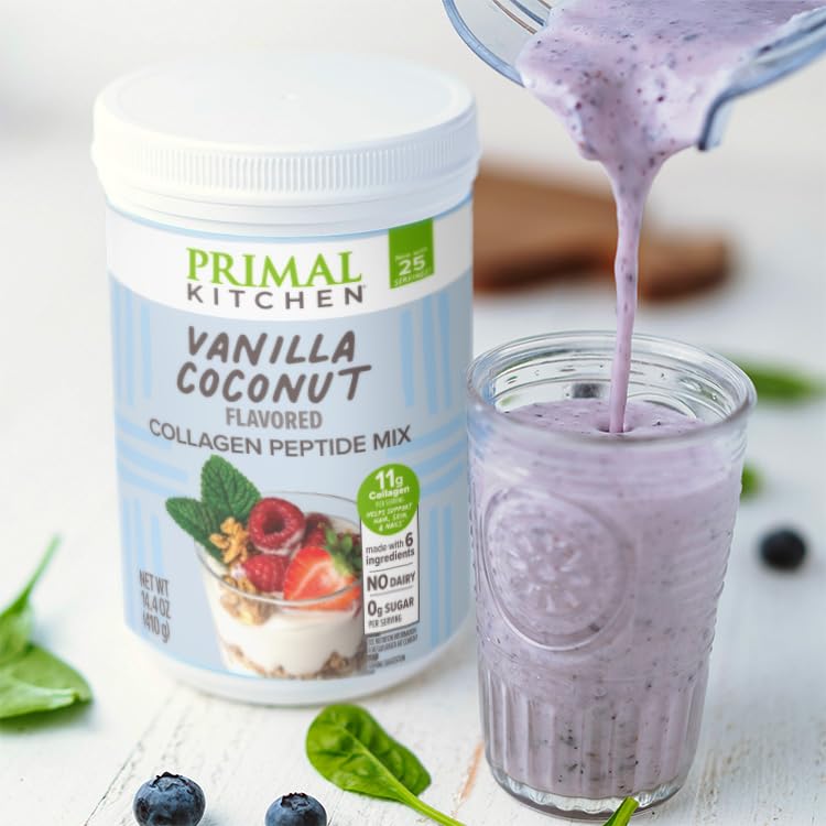 Stirring Primal Kitchen collagen fuel into a smoothie for vanilla coconut flavor.