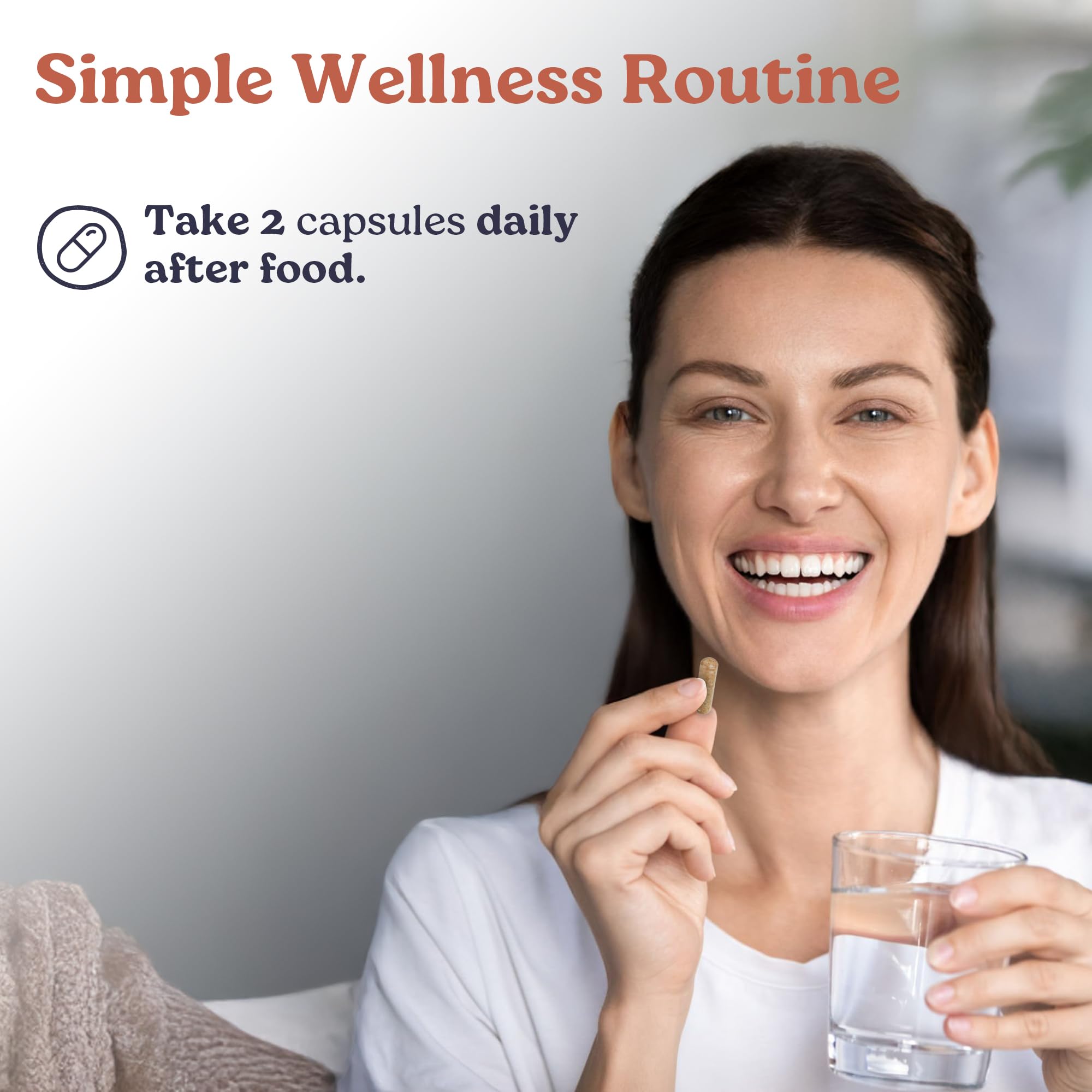 Primal Woman taking capsule demonstrates simple daily wellness ritual.