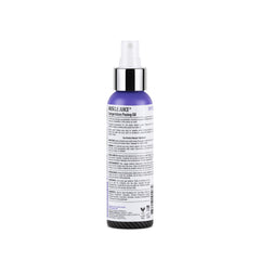 Applying Pro Tan Muscle Juice for even definition during a shoot