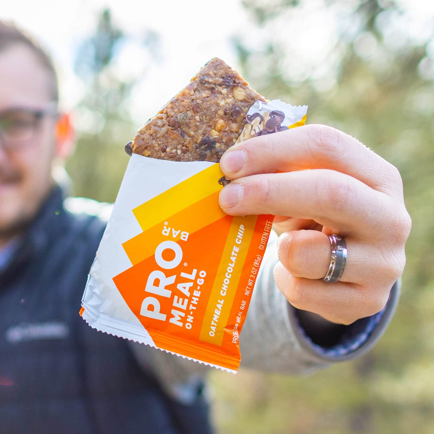 PROBAR bite close-up shows chewy texture and chocolate chips.