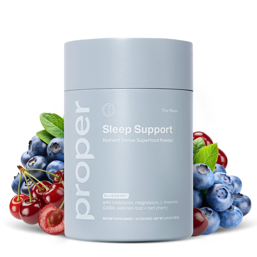 Proper Blues Sleep Aid powder tub close-up highlighting blueberry flavor for nighttime calm.