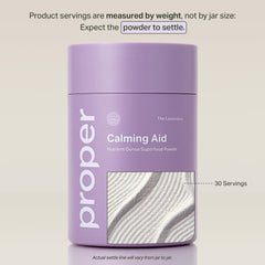 Proper Lavenders Calming Aid glass with mix dissolving in water for stress-friendly routine.