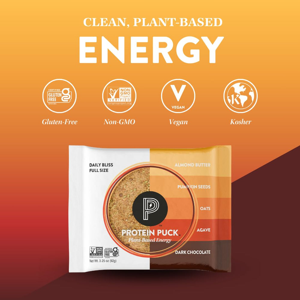 Protein Puck Daily Bliss bar reveals visible fruits and seeds in every bite.