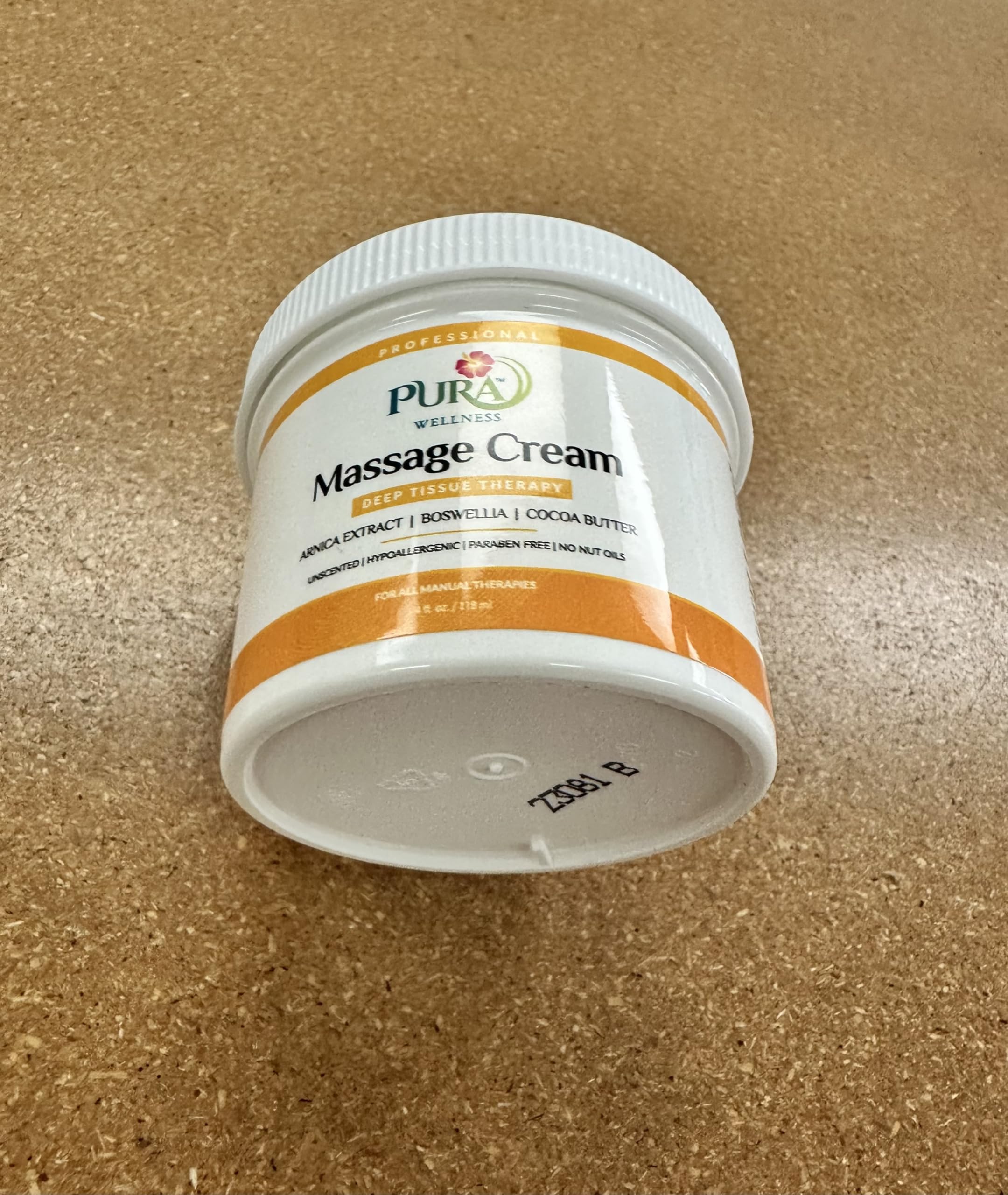 PURA 1st Wellness cocoa butter presence suggests rich spread for massage